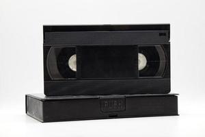 Vintage VHS video tape cassette with plastic cassette box. Retro style technology from the 90s