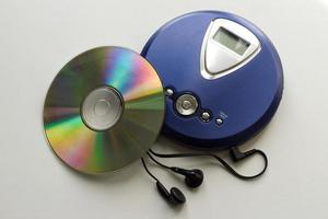 Vintage CD Player with headphones isolated on white background. Vintage Technology from the 90s. photo