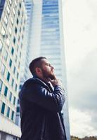 fashionable well dressed man with beard photo