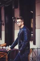 man in leather jacket photo