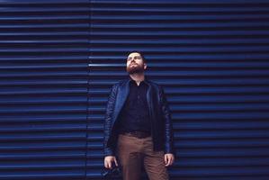 man wearing a leather jacket photo