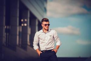 Fashion portrait of young sexy model man photo