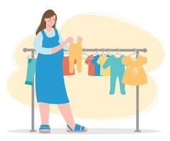 Pregnant woman chooses baby clothes in store, she has sliders for newborn in her hands vector