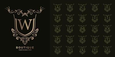 Letter W or collection initial alphabet with luxury ornament floral frame golden logo template. vector