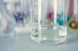 laboratory flask on table photo