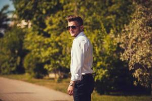 Man wearing shirt and watch photo