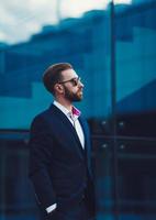 man posing in fashionable suit photo