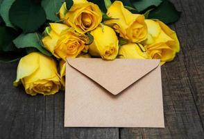 Yellow roses on a table photo