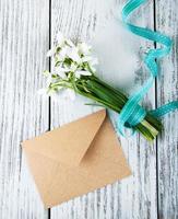 bouquet of snowdrops with envelope