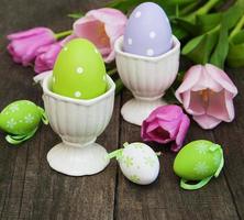 Easter eggs and tulips photo