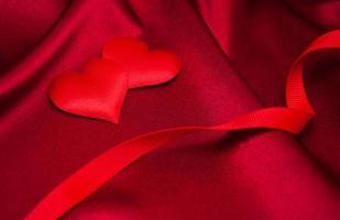 Red hearts and silk photo
