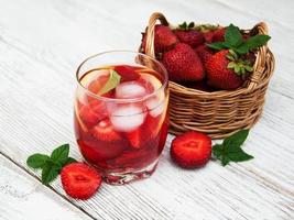 Lemonade with strawberries photo