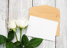 White roses and envelope photo