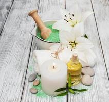 Spa products with white lilies photo