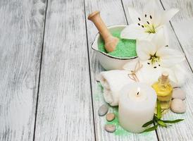 Spa products with white lilies photo