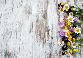 Wild flowers on a table photo