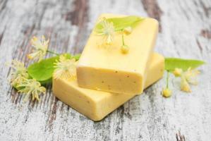 Handmade soap and linden flowers photo