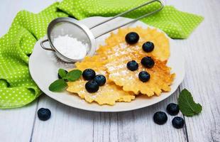 Waffles with blueberries photo