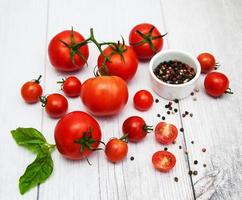 Fresh tomatoes on a table photo