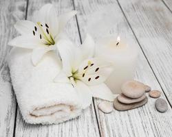 Spa products with white lily photo