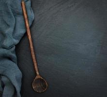 Stone table with towel and spoon photo