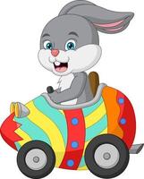 Cartoon little bunny driving easter car egg vector