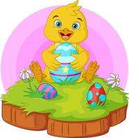 Cartoon little chick with easter egg in the grass vector
