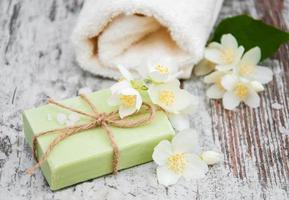 Handmade soap and jasmine flowers photo