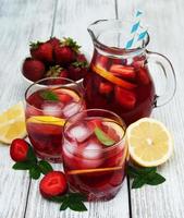 Lemonade with strawberries photo