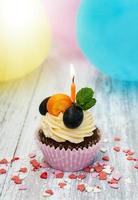 Cupcake with a candle photo
