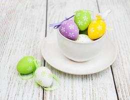 Easter eggs in a cup photo