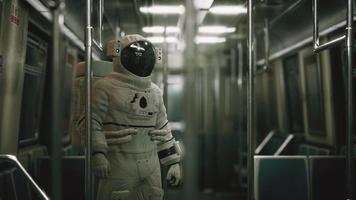 Astronaut Inside of the old non-modernized subway car in USA video