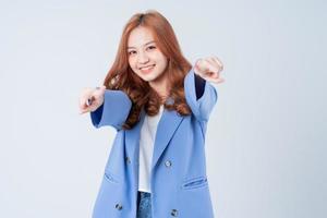 Young Asian woman posing on white background photo