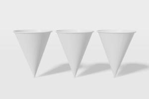 juego de tres vasos de maqueta de papel blanco en forma de cono sobre un fondo blanco. representación 3d foto
