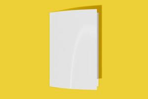 Mockup vertical booklet, brochure, invitation isolated on a yellow background with soft cover and realistic shadow. 3D rendering. photo