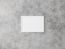 White horizontal picture frame on the background of a concrete wall. Grunge interior. 3D rendering. photo