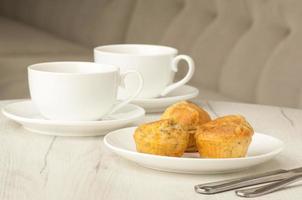 cake and cup of coffee on the table photo