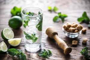 Glass of mojito with ingredients photo