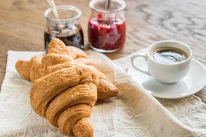Croissants with cup of coffee photo