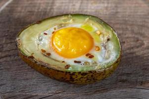 Baked egg in avocado photo