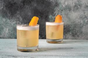 Glasses of whiskey sour photo