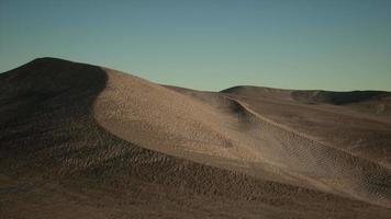Aerial view on big sand dunes in Sahara desert at sunrise video