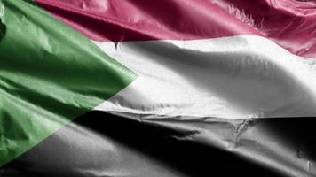 sudan textilfahne weht langsam auf der windschleife. Das sudanesische Banner bewegt sich sanft im Wind. Stoff Textilgewebe. voll ausfüllender Hintergrund. 20 Sekunden Schleife. video