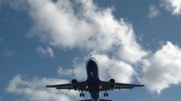 A close up of a flying aircraft bottom video