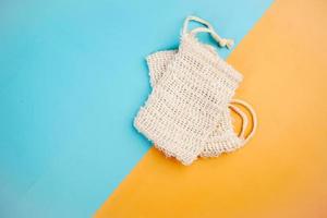 empty soap bag on color background , photo