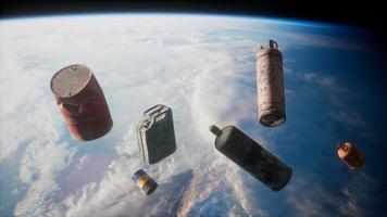 Space debris, pollution of the atmosphere of the planet Earth and space by human waste. Elements furnished by NASA video