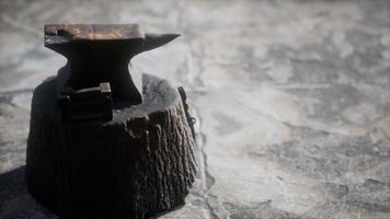 Old anvil attached to a stump video