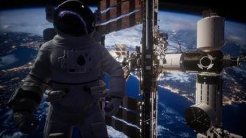 International Space Station and astronaut in outer space over the planet Earth video