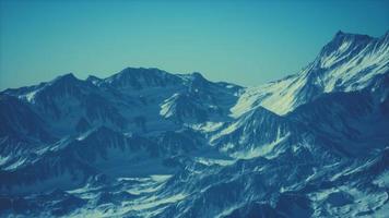 Aerial view of the Alps mountains in snow video