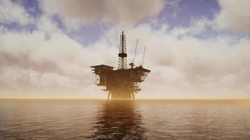 Offshore Jack Up Rig in The Middle of The Sea at Sunset Time video